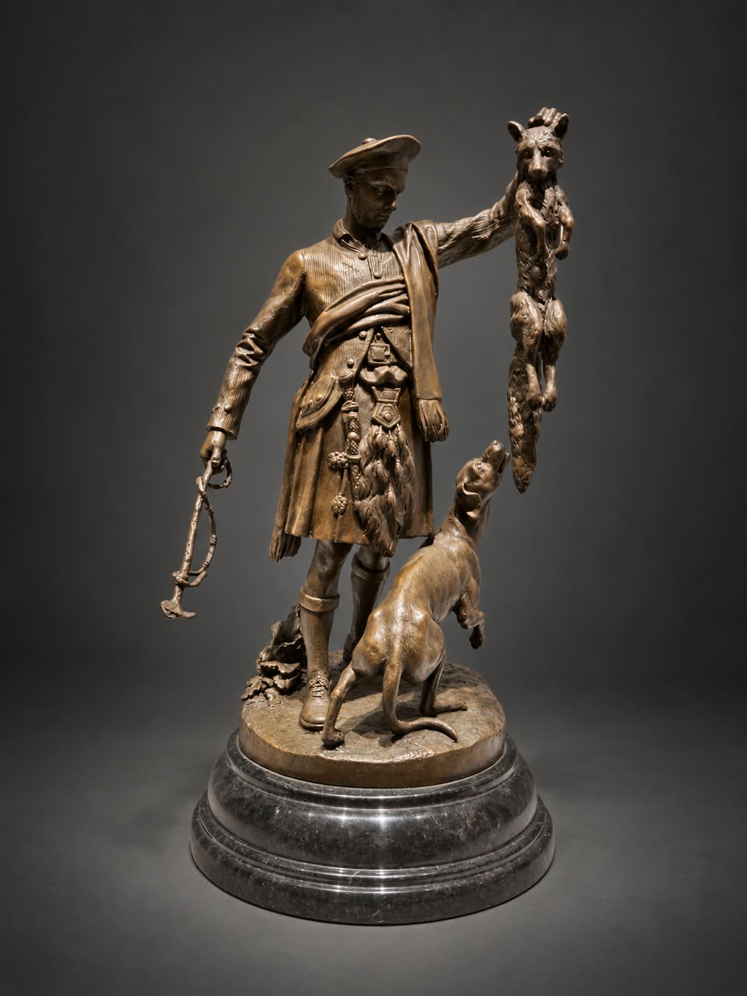 Bronze toned sculpture of a hunter and aloft